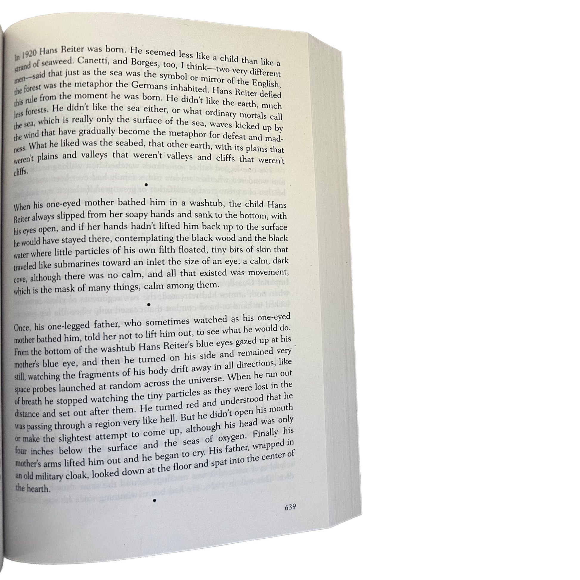 Open copy of 2666 with text on a white background