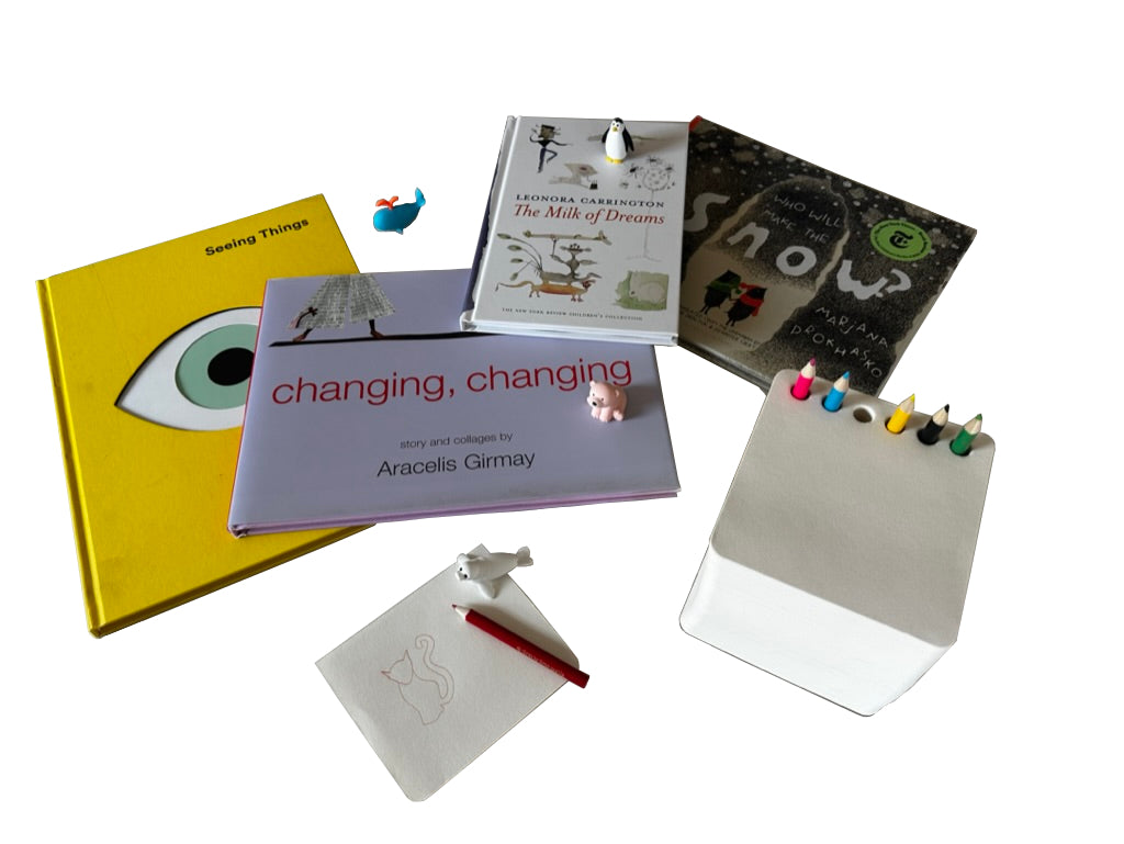 Collection of books and stationery items on a white background