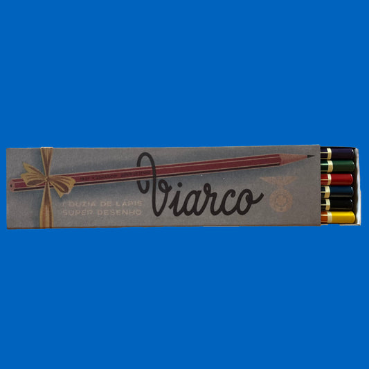Box of Viarco drawing pencils with colored tips on a blue background