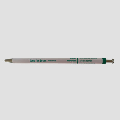 Light pink pen with visible branding on a white background