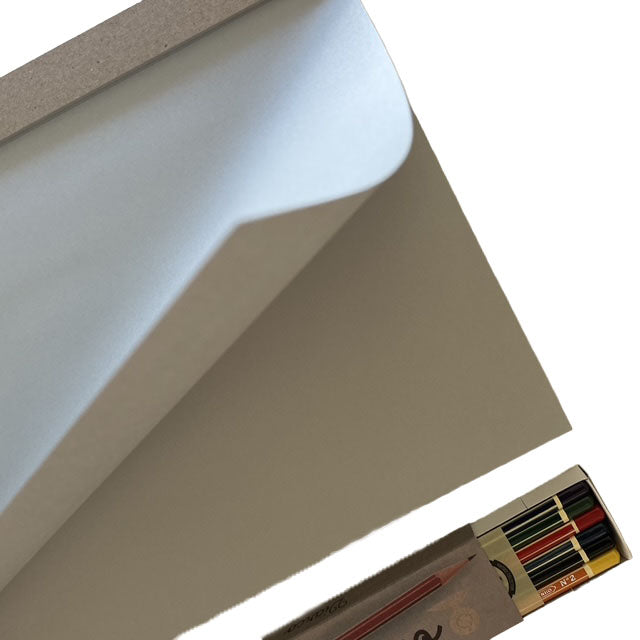 Sheet of grey paper with a pencil on a white background