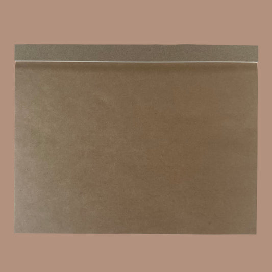 Brown drawing pad on a brown background
