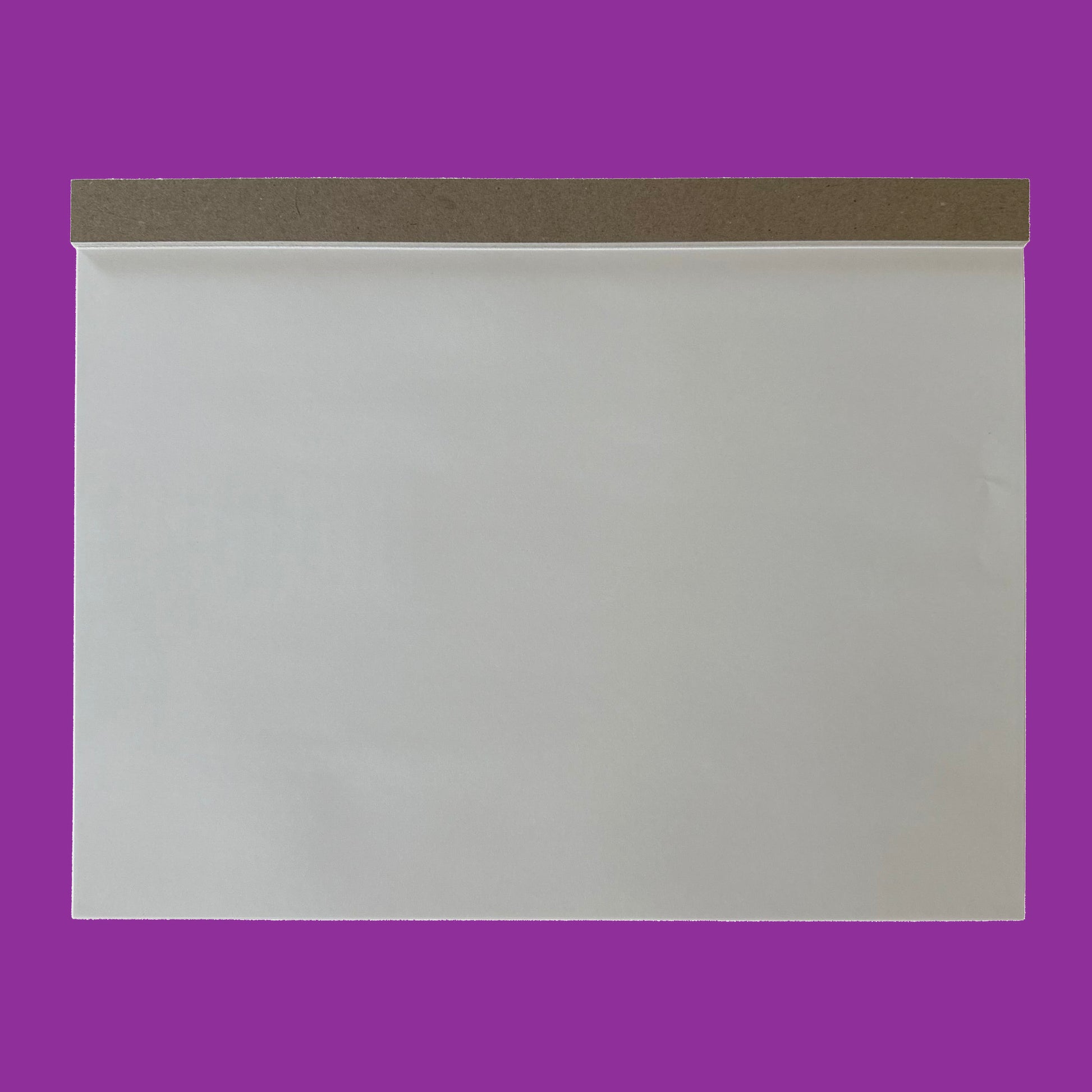 White drawing pad with a purple background