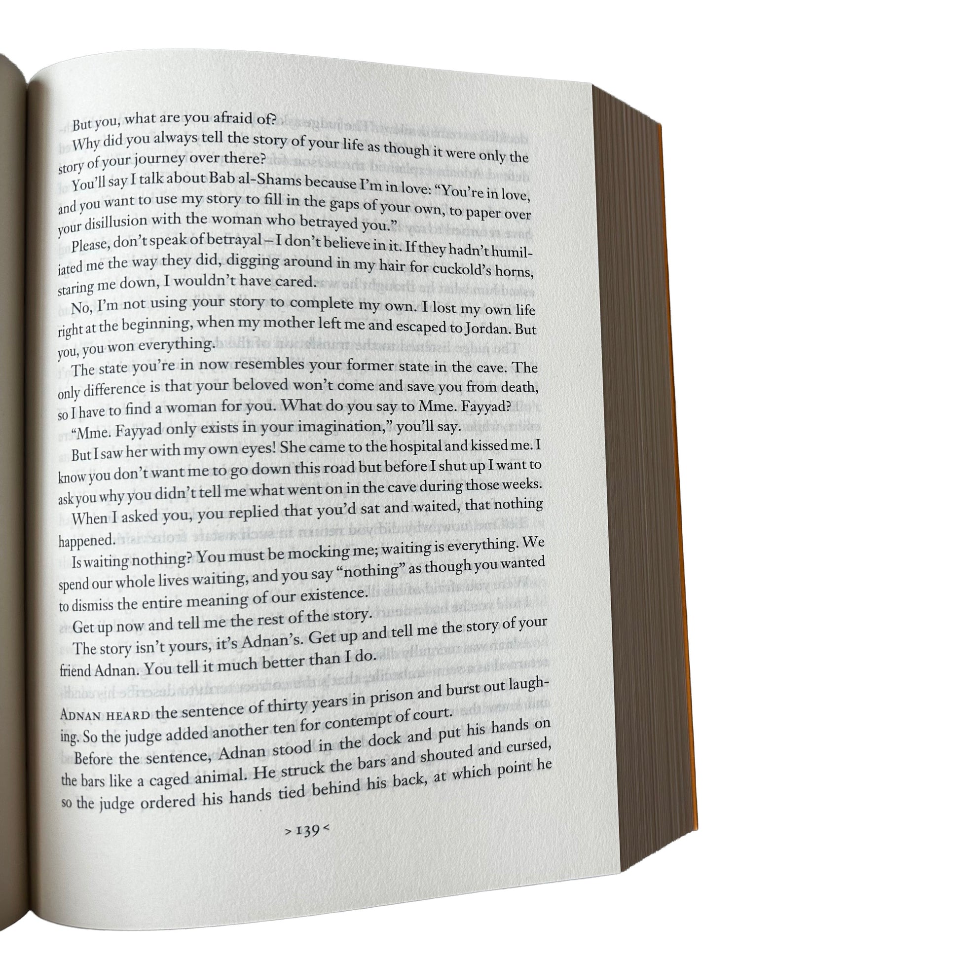 Open copy of Gate of the Sun with text on a white background