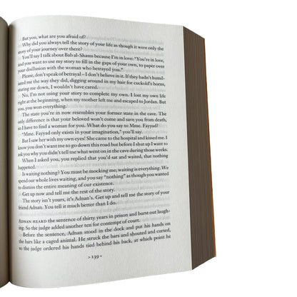 Open copy of Gate of the Sun with text on a white background