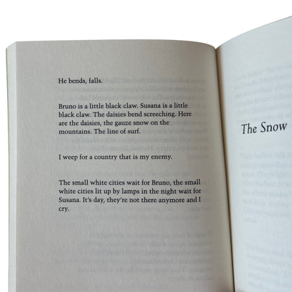 Open copy of INRI with text on a white background