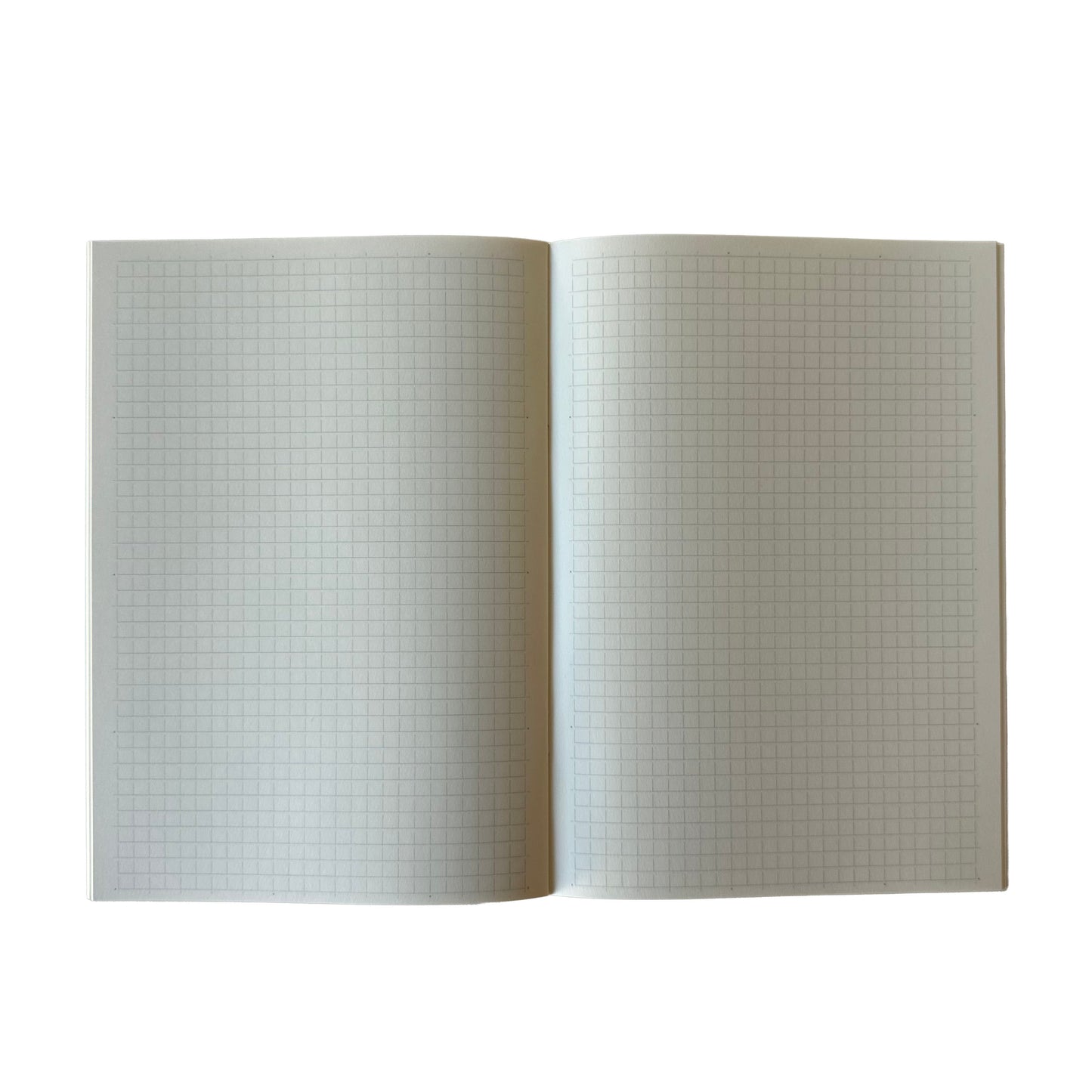 Open notebook with grid pages on a white background