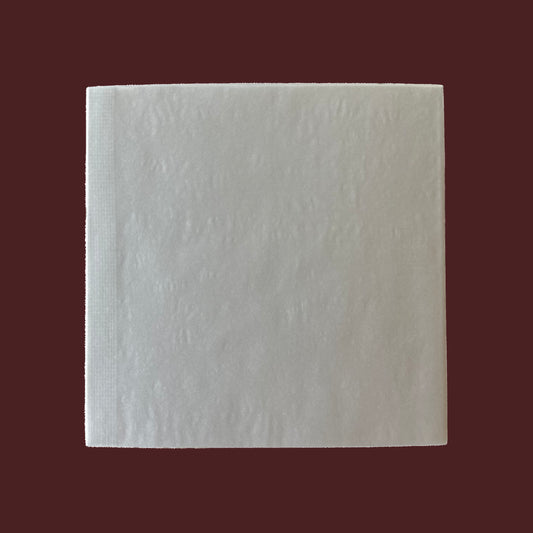 White notebook on a dark red background