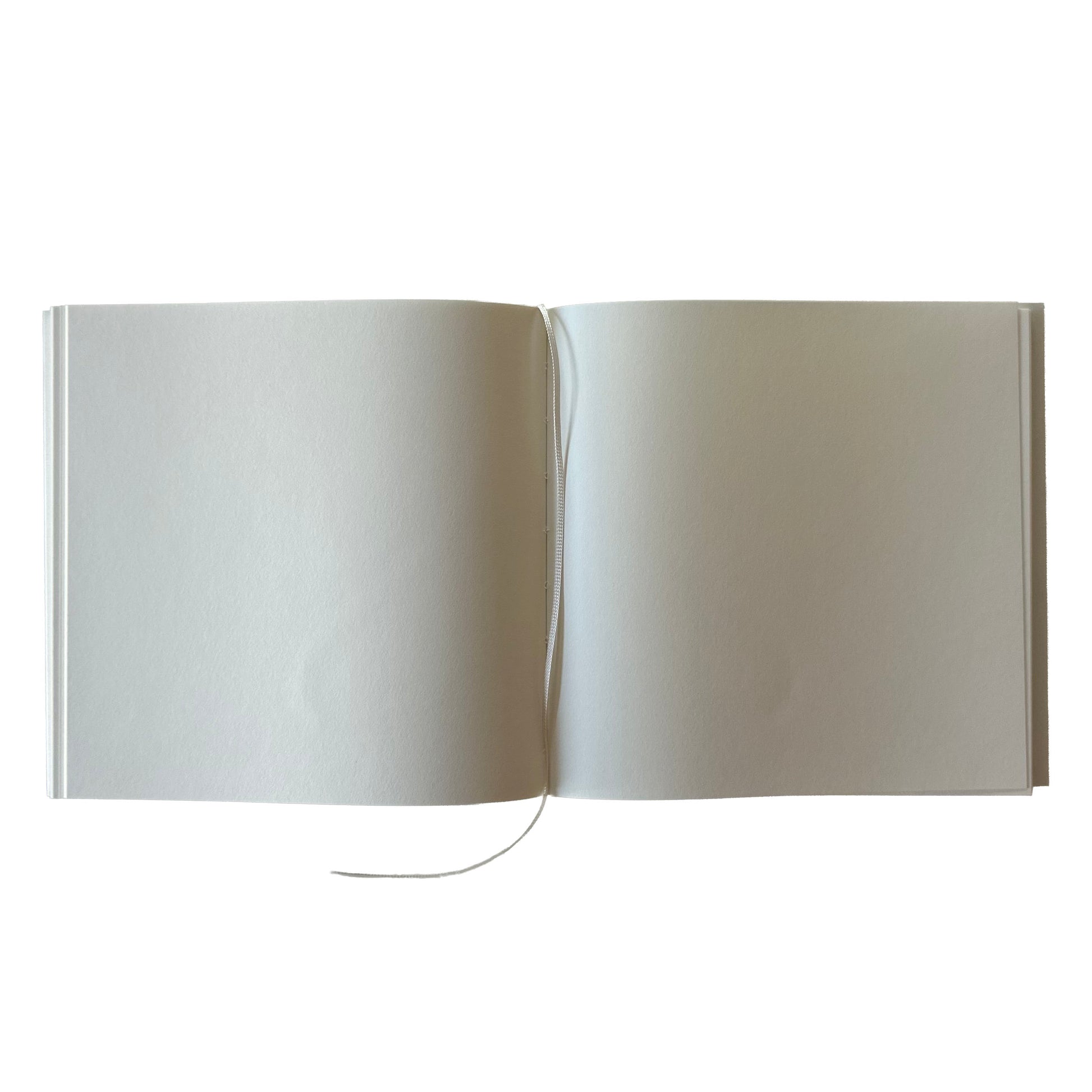 Open notebook with white pages on a white background
