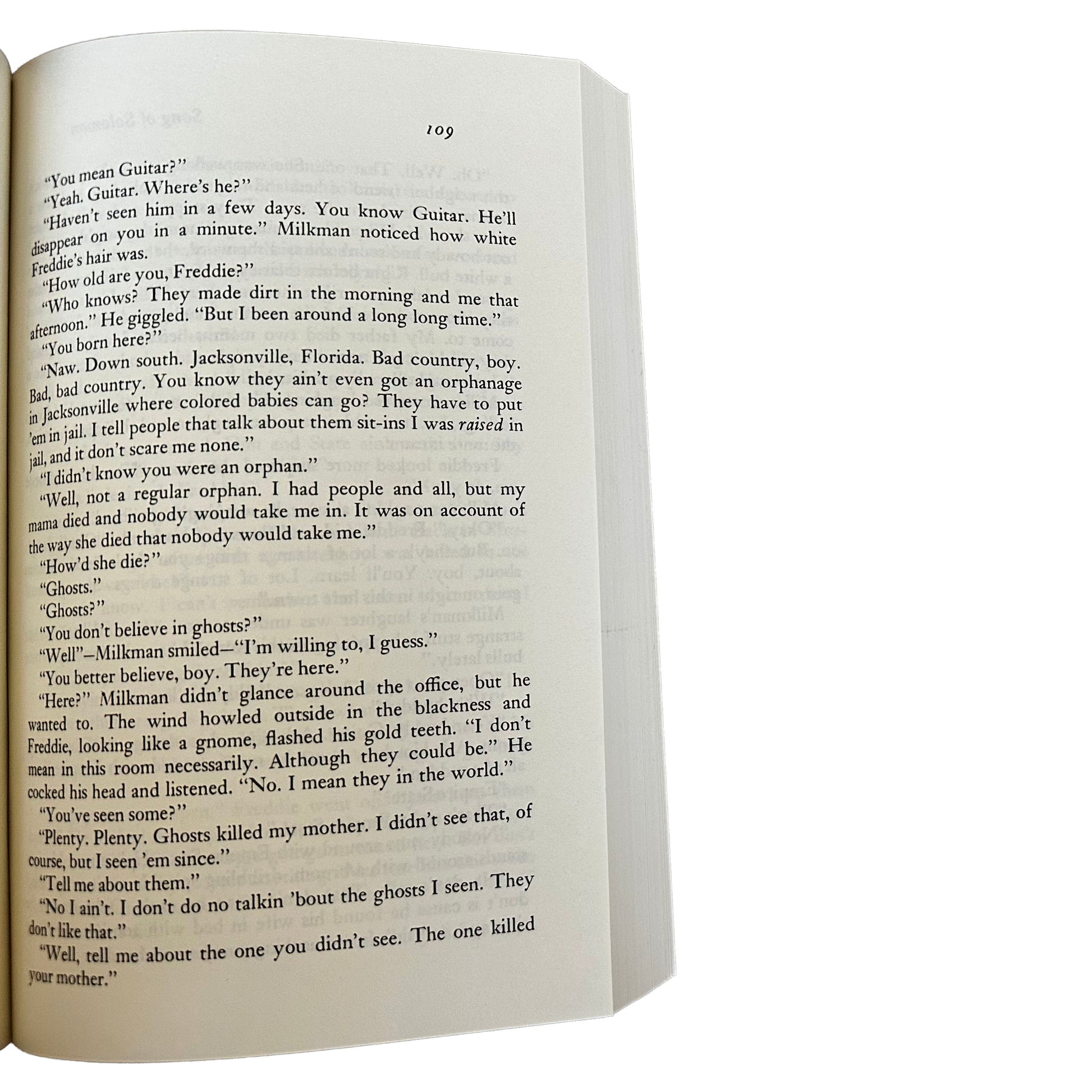 Open copy of Song of Solomon with text on a white background