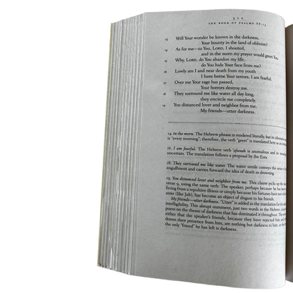 Open page of The Book of Psalms with text on a white background