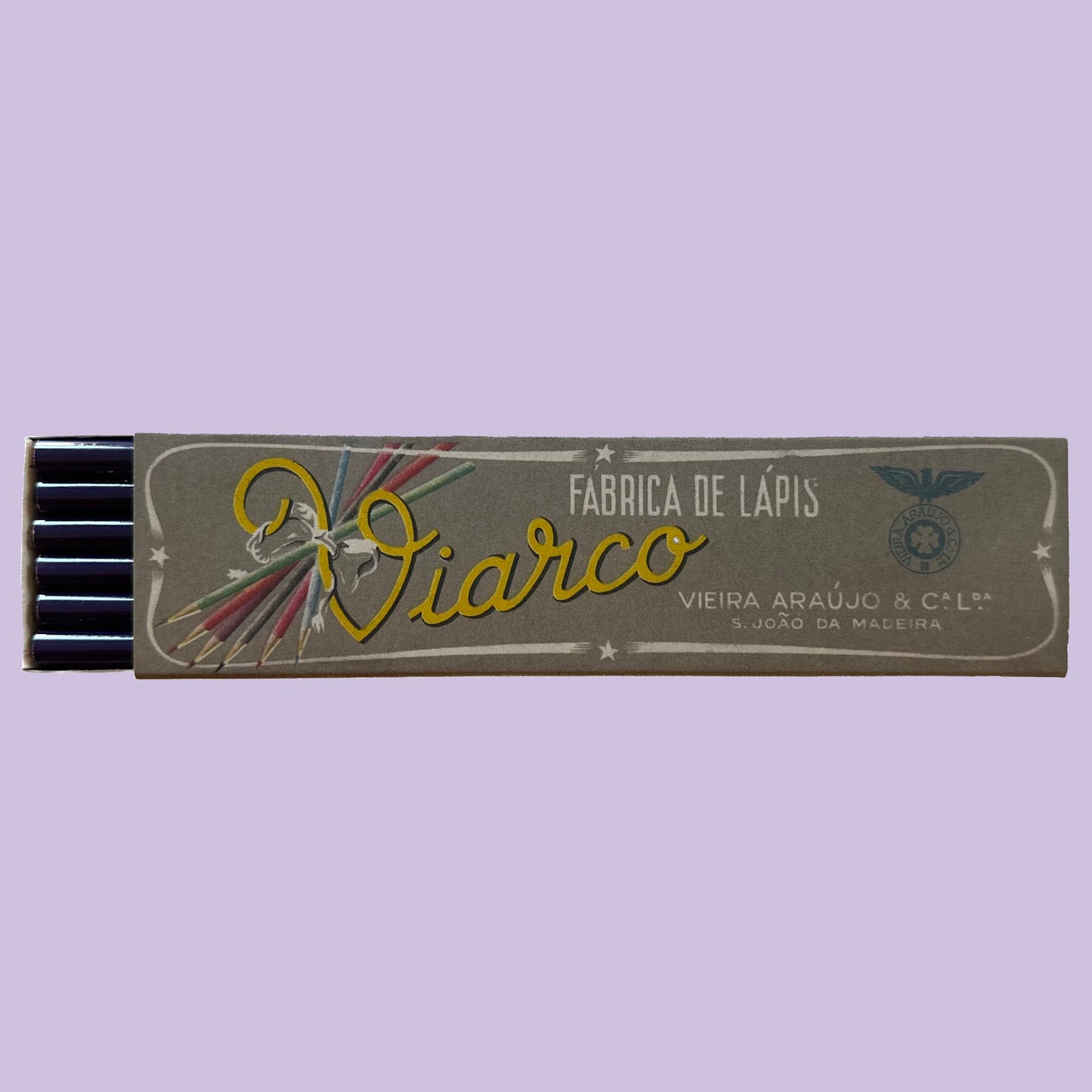 Violet Pencil box with 'Viarco' branding on a light purple background