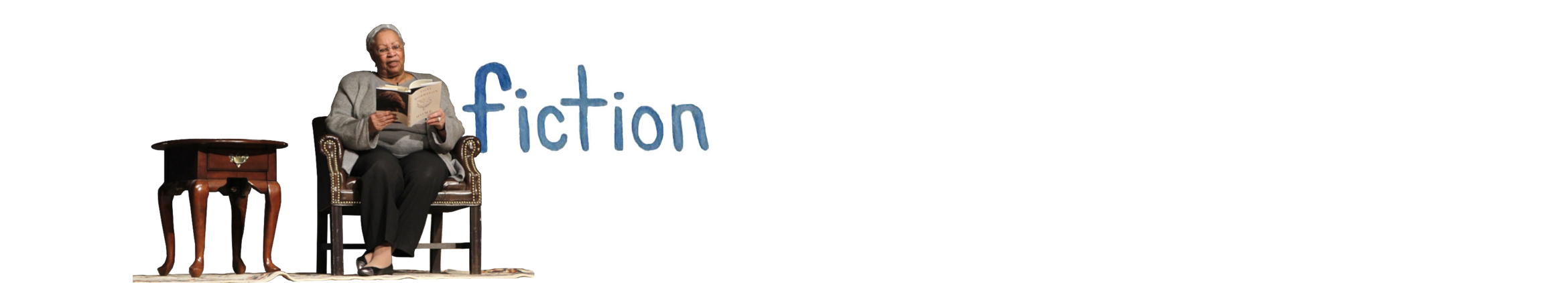 Person sitting on a chair with a table, text 'fiction' displayed.